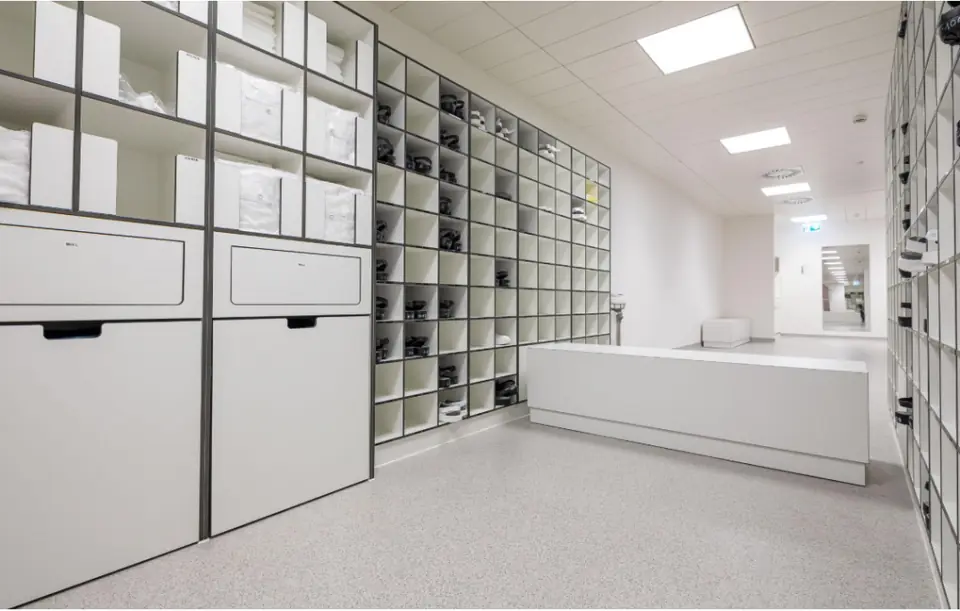 Hospital storage room fitted with modular shelving and cabinets